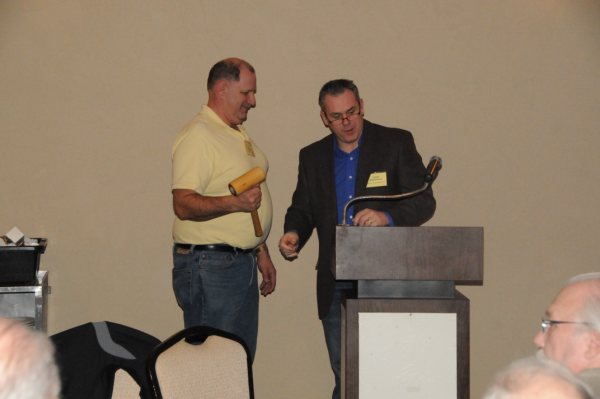 Dale Raisleger accepts Presidency gavel from Jim Westerman